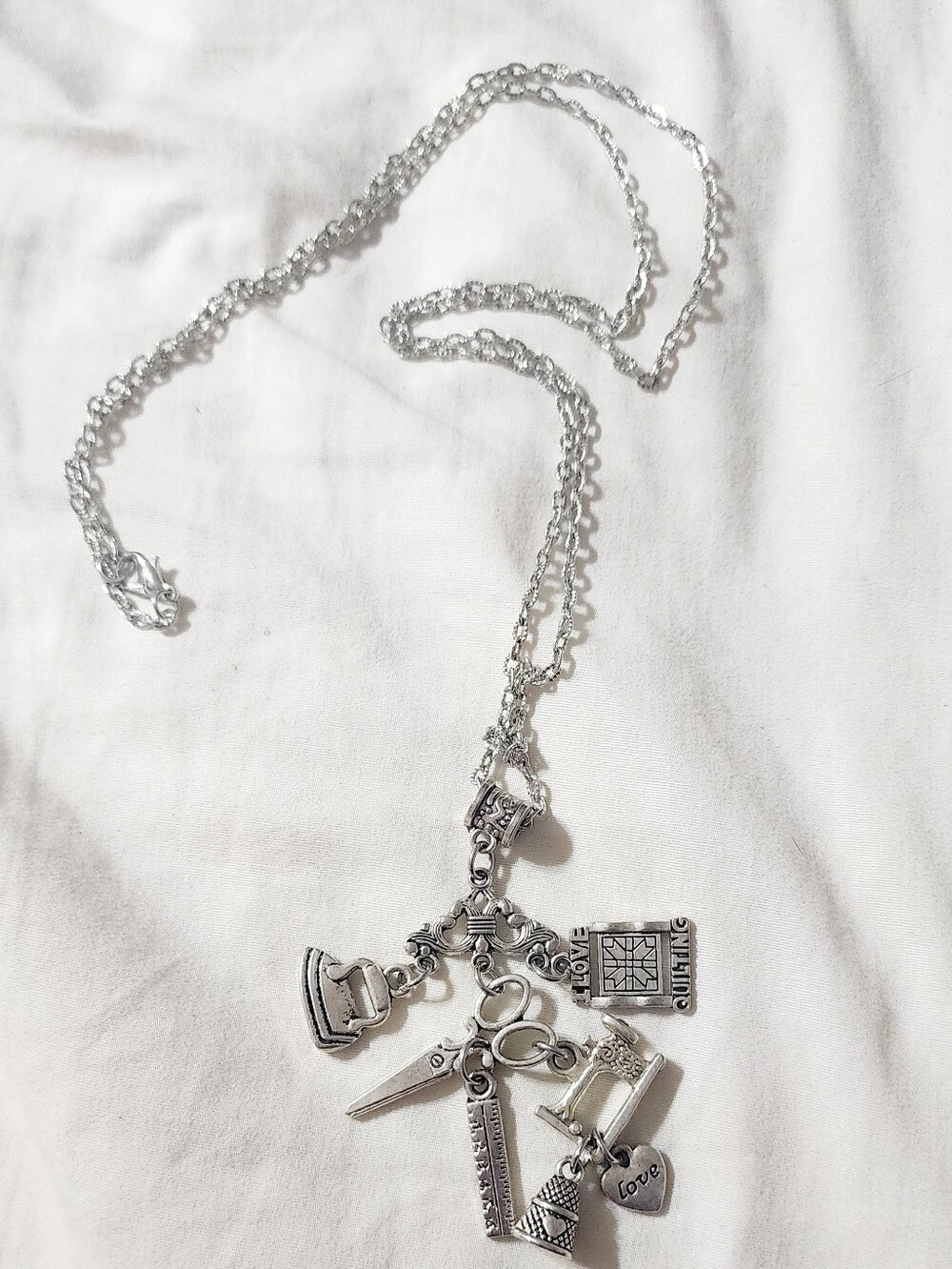 Silver Charm Necklace with Sewing-Themed Charms
